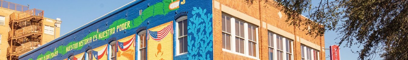 Mural "Our Story Our Power" by Ricardo Castillon and Itzel Vilches on the Martha C. Navarez Aptments in Down Town Laredo, TX.